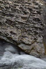An eroded rock in a stream