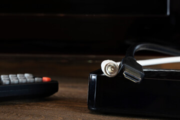 TV set-top box on a wooden background
