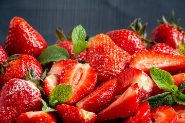 Appetizing juicy bright strawberries, sprinkled with powdered sugar - vitamin composition, the...