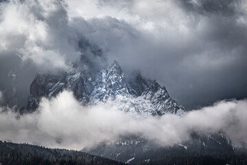 Clouds over the mountains of the Langkofel massif in the Italian Dolomites