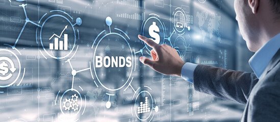 Businessman clicks a bonds virtual screen. Bond Finance Banking Technology concept. Trade Market Network