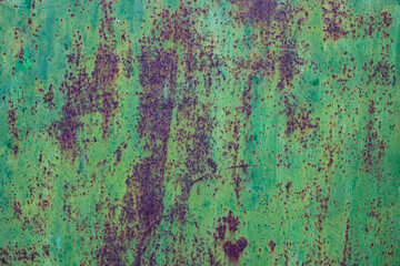 Metal of a metal door, weathered in southern Spain