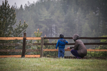 Mother and child playing and bonding in nature