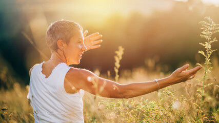 Positive Sunshine - Mindful Woman Enjoying Sunlight, Embracing the Positive Feelings Created by Sunshine