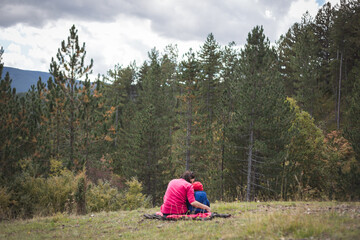 Mother and child enjoying picnic in nature