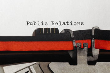 Text Public Relations typed on retro typewriter