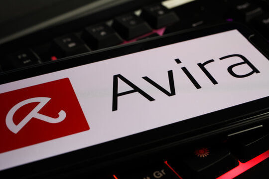 Viersen, Germany - March 1. 2021: Closeup of mobile phone with logo lettering of avira anti virus computer security software on keyboard