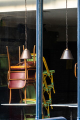 Window of an empty restaurant forced to close amid COVID-19 pandemic