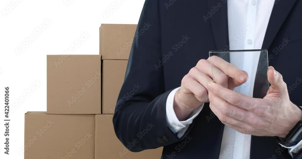 Poster animation of businessman using clear digital tablet with stacks of boxes on white background