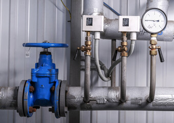 Gate valve, sensors and alarm in the gas boiler room.