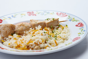 rice with chicken kebab and vegetables