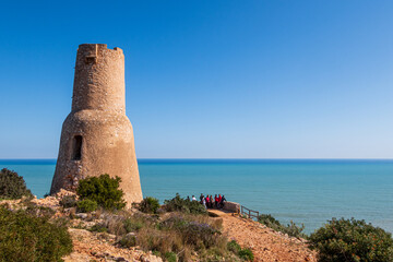 Fototapeta na wymiar Different views of the beautiful Torre Del Gerro in Denia, with the Mediterranean Sea in the background on a clear and sunny day.