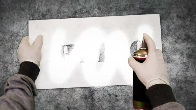 Change sign spray painted on the concrete wall. Graffiti concept art welcome quote and positive greeting icon. Airbrush paint with template in hand. City abstract artwork.