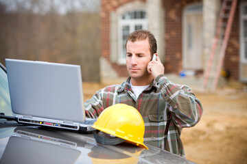 Construction: Checking Something with Manager on Phone
