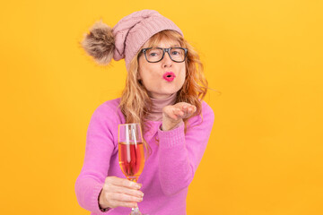 isolated adult woman with cup blowing a kiss