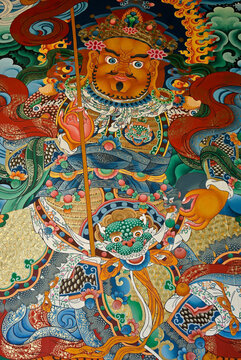 Colorful mural of a guardian deity at Songzanlin Tibetan Buddhist monastery, Shangri-la, Yunnan Province, China