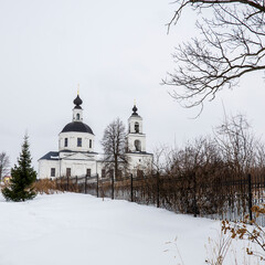 landscape with a rural orthodox church in winter