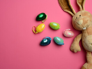 cute plush bunny with long ears, decorative egg