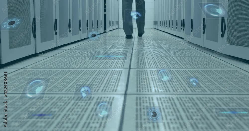 Poster multiple round scanners against mid section of man walking in computer server room