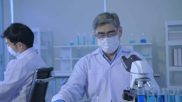 Research concept of 4k resolution. Scientists are stressed about laboratory research.