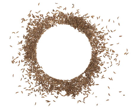 Pile of cumin, frame caraway seeds isolated on white background, top view