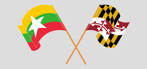 Crossed and waving flags of Myanmar and the State of Maryland