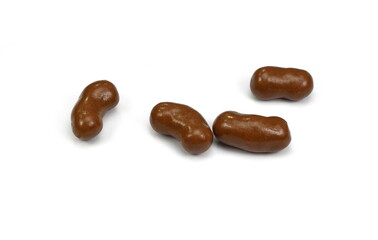 Obraz premium Chocolate, sweet crunchy snack isolated on white background. Chocolate balls on white background. chocolate covered corn flips.