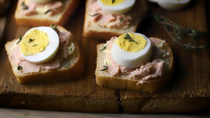 Selective focus. Sandwiches with cod roe and egg. Healthy snack. Keto.