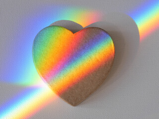 heart shape cardboard with a lightpainted rainbow, white canvas background