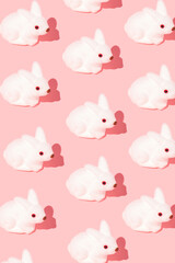 Creative Easter bunny or rabbit pattern. Minimal spring Holiday concept. Pastel background.
