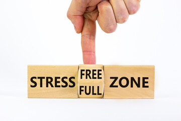 Stress free zone symbol. Doctor turns a cube and changes words 'stress full zone' to 'stress free zone'. Beautiful white background. Psychological, business and stress free zone concept. Copy space.
