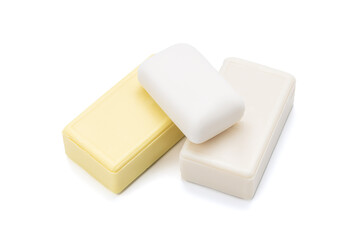 yellow and white soap bars isolated on white background. antibacterial soap bricks cut out