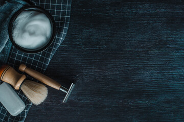 Shaving tools on a black background.