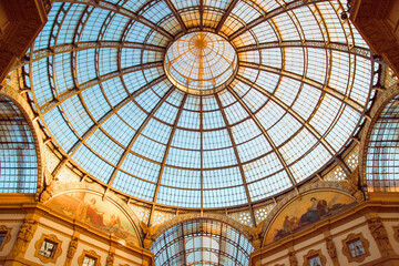 Dome of the Galleria Vittorio Emanuele II with a glow of light that illuminates the painting