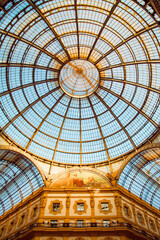 Vittorio Emanuele II gallery dome with glow of light that illuminates the frescoDome of the Galleria Vittorio Emanuele II with a glow of light that illuminates the painting