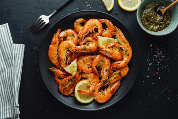 Shrimps with spices on plate