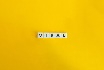 Viral Word on Block Letters against Yellow Background.