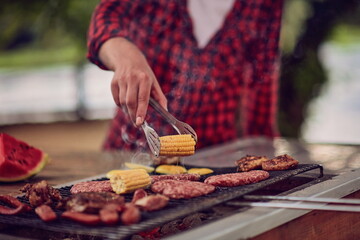 man cooking tasty food for french dinner party