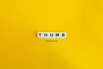 Thumb Stopping Buzzword and Concept. Block Letters on Yellow Background.