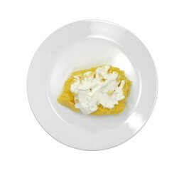 Polenta with Cheese and Sour Cream in a Plate isolated on white background.