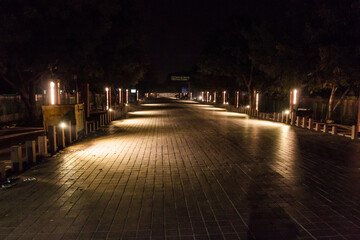 Night view of Taj East Gate road leading to Taj Mahal in Agra, India
