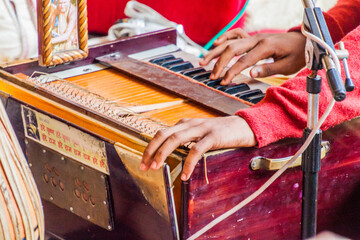 VRINDAVAN, INDIA - FEBRUARY 18, 2017: Pump organ in Krishna Balaram Mandir temple (Temple of ISKCON...