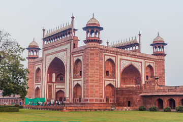 Fototapeta na wymiar AGRA, INDIA - FEBRUARY 19, 2017: People enter the Great Gate, gateway to Taj Mahal complex.