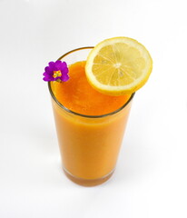 Glass of milkshake or cocktail isolated on white background.  Mango, grapefruit, tangerine mix. 