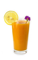 Glass of milkshake or cocktail isolated on white background.  Mango, grapefruit, tangerine mix. 