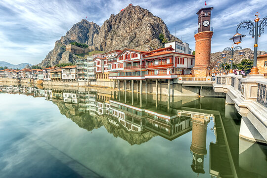 Landscape of historical houses, clock tower and Green River (Turkish: Yesilirmak) of Amasya city. Amasya is a city in northern Turkey and is the capital of Amasya Province, in the Black Sea Region.