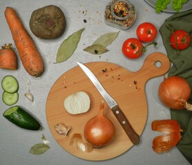 The process of pedestal food, vegetable dish, sauerkraut. On the table on a cutting board lies...