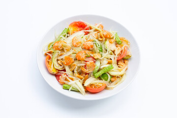 Dish of spicy papaya salad on white.
