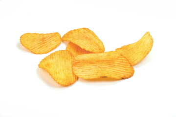 Ribbed potatoes snack chips close up isolated on white background.