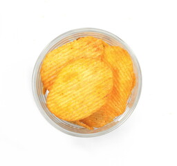 Ribbed potatoes snack chips close up isolated on white background.